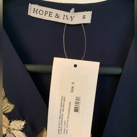 Hope & Ivy Neck Wrap Dress in Navy with Floral Embroidery and waist bow tie - Picture 6 of 6